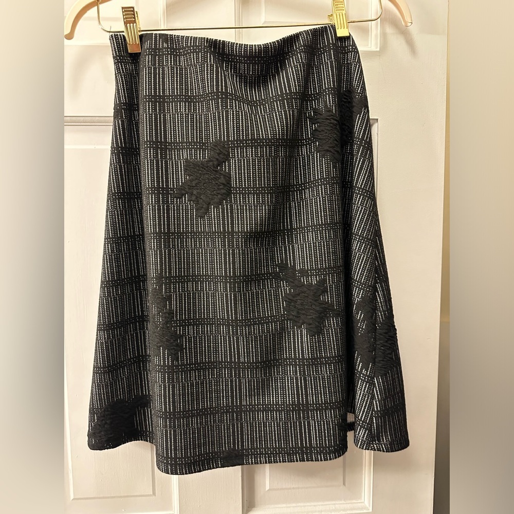 Mid length skirt.